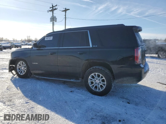 2015 GMC Yukon SLE with VIN 1GKS2AKC0FR267745, listed as a Copart auction lot 84876234 with 145,716 mi miles and Clean Title. Bid and sale history available at carsss.com. Image 2.