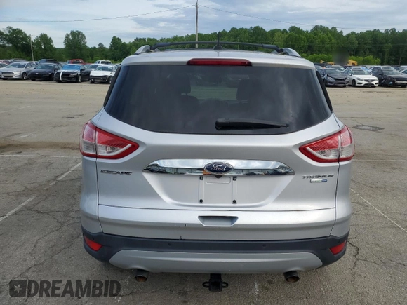 2015 Ford Escape Titanium с VIN 1FMCU9J99FUC33052, выставлен на аукционе Copart как лот 56508365 с пробегом Не указан миль и На запчасти • Non repairable. История ставок и продаж доступна на DreamBid. Изображение 6.