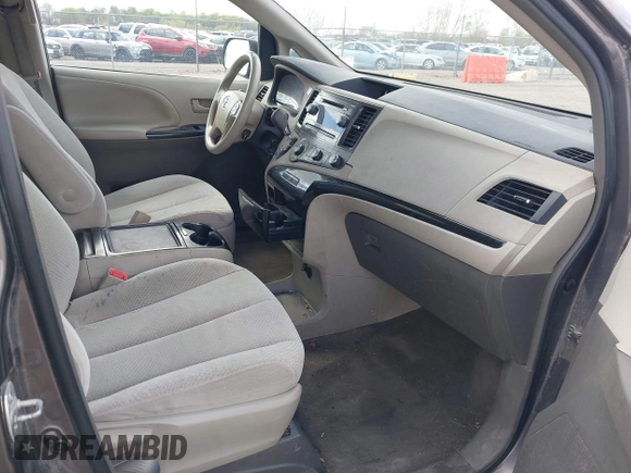 2012 Toyota Sienna LE AAS with VIN 5TDKK3DC5CS270481, listed as a IAAI auction lot 42093687 with 208,899 mi miles. Bid and sale history available at carsss.com. Image 5.