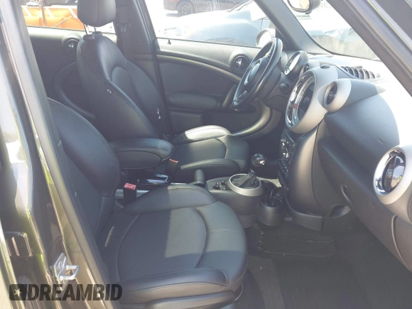 2012 MINI Countryman S z VIN WMWZC3C55CWL83472, wystawiony jako IAAI lot #42289981 z przebiegiem 101 812 mil mil oraz . Historia ofert i sprzedaży dostępna na DreamBid. Obrazek 5.
