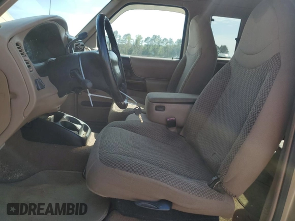 1999 Ford Ranger XL with VIN 1FTYR14V7XPB20433, listed as a Copart auction lot 51450535 with 103,057 mi miles and Salvage title. Bid and sale history available at DreamBid. Image 7.