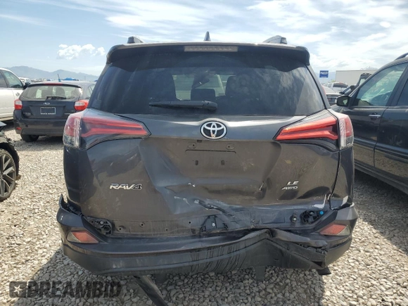 2017 Toyota RAV4 LE with VIN 2T3BFREV4HW592199, listed as a Copart auction lot 58538915 with 137,964 mi miles and Salvage title. Bid and sale history available at DreamBid. Image 6.