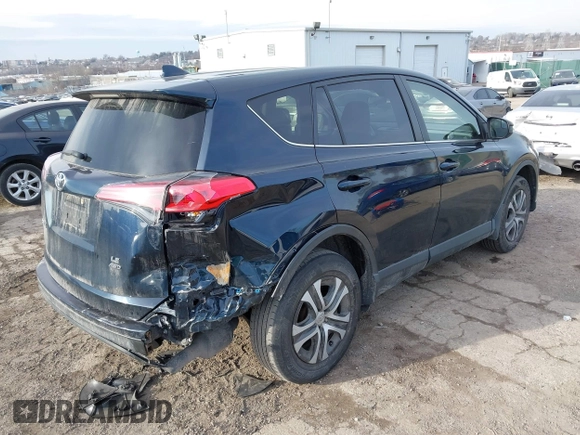 2018 Toyota RAV4 LE with VIN JTMBFREV5JD253342, listed as a IAAI auction lot 41656581 with 243,791 mi miles and . Bid and sale history available at DreamBid. Image 4.
