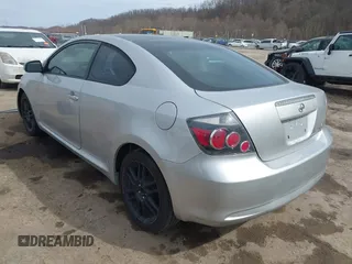 2010 Scion tC with VIN JTKDE3B75A0308354, listed as a IAAI auction lot 41811355 with 152,369 mi miles. Bid and sale history available at carsss.com. Image 3.