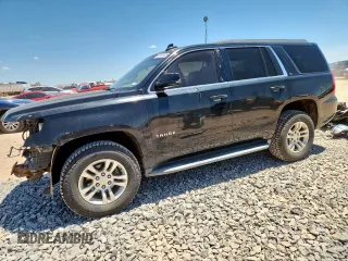2015 Chevrolet Tahoe LT with VIN 1GNSKBKCXFR702764, listed as a Copart auction lot 63853485 with 216,520 mi miles and Salvage title. Bid and sale history available at DreamBid. Image 1.