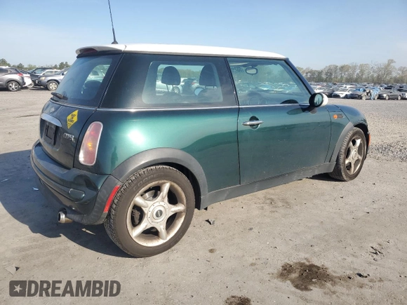 2004 MINI Hardtop with VIN WMWRC334X4TJ61391, listed as a Copart auction lot 53735615 with 103,974 mi miles and Salvage Title. Bid and sale history available at DreamBid. Image 3.