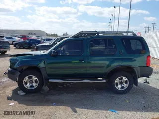 2001 Nissan Xterra XE with VIN 5N1ED28T61C526634, listed as a IAAI auction lot 41764950 with 243,574 mi miles. Bid and sale history available at carsss.com. Image 14.