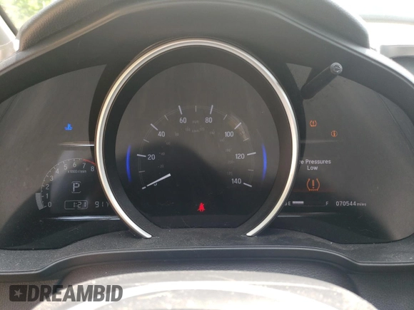 2018 Honda Fit EX с VIN 3HGGK5H89JM717562, выставлен на аукционе Copart как лот 60090475 с пробегом 70 544 миль миль и Списание • Salvage title. История ставок и продаж доступна на DreamBid. Изображение 9.