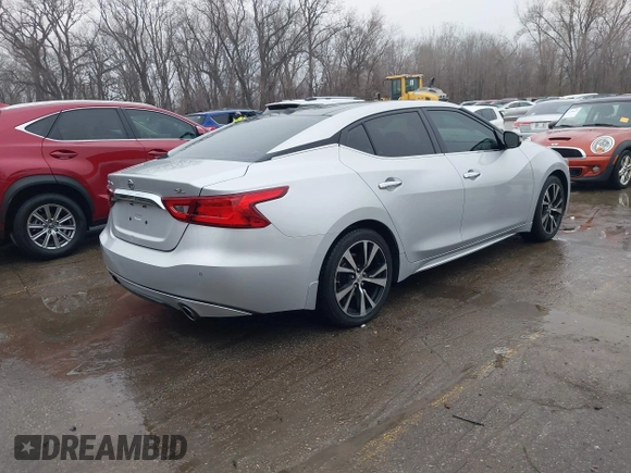 2018 Nissan Maxima SL z VIN 1N4AA6AP1JC394078, wystawiony jako IAAI lot #41197428 z przebiegiem 91 281 mil mil oraz . Historia ofert i sprzedaży dostępna na DreamBid. Obrazek 4.