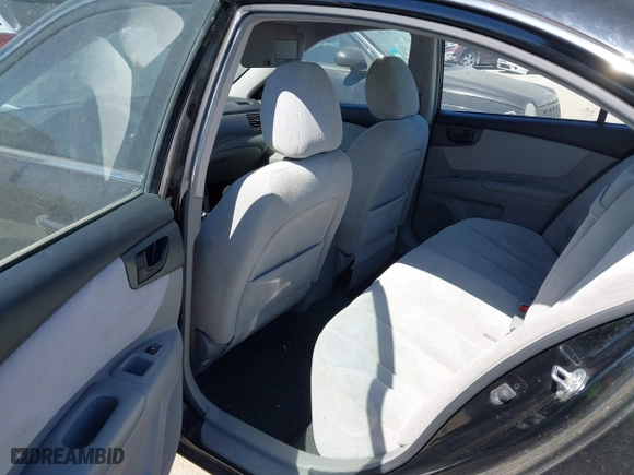 2008 Kia Optima LX with VIN KNAGE123985242231, listed as a IAAI auction lot 41838786 with 217,754 mi miles. Bid and sale history available at carsss.com. Image 8.