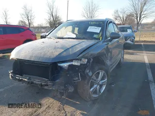 2021 Audi Q3 S line Premium with VIN WA1DECF37M1075942, listed as a IAAI auction lot 41192874 with 50,670 mi miles. Bid and sale history available at carsss.com. Image 2.