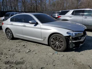 2018 BMW 5 Series 530i xDrive with VIN WBAJA7C51JWA74673, listed as a Copart auction lot 49479335 with 98,312 mi miles and Salvage Title. Bid and sale history available at carsss.com. Image 4.