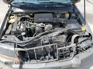 2000 Jeep Grand Cherokee Laredo with VIN 1J4GW48N1YC324356, listed as a Copart auction lot 62011305 with 242,322 mi miles and Salvage title. Bid and sale history available at DreamBid. Image 12.