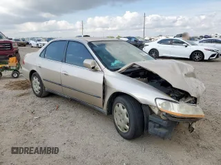2000 Honda Accord LX z VIN 1HGCG5640YA035354, wystawiony jako Copart lot #58934115 z przebiegiem 167 536 mil mil oraz Szkoda całkowita • Salvage title. Historia ofert i sprzedaży dostępna na DreamBid. Obrazek 4.