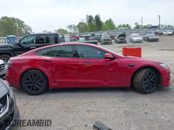 2022 Tesla Model S with VIN 5YJSA1E58NF470737, listed as a IAAI auction lot 42035040 with 15,224 mi miles and . Bid and sale history available at DreamBid. Image 13.