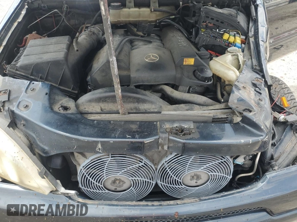 2000 Mercedes-Benz M 320/430/500 with VIN 4JGAB72E7YA168445, listed as a Copart auction lot 59401235 with 231,591 mi miles and Salvage title. Bid and sale history available at DreamBid. Image 12.