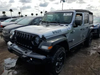 2021 Jeep Wrangler Unlimited Sport Altitude with VIN 1C4HJXDNXMW555815, listed as a Copart auction lot 75677724 with Not provided miles and Non repairable. Bid and sale history available at DreamBid. Image 1.
