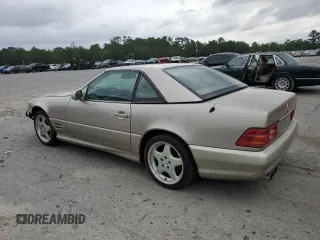1999 Mercedes-Benz SL 500 z VIN WDBFA68F4XF184352, wystawiony jako Copart lot #57874355 z przebiegiem 215 118 mil mil oraz Tytuł czysty. Historia ofert i sprzedaży dostępna na DreamBid. Obrazek 2.