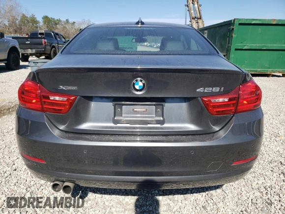 2015 BMW 4 Series 428i xDrive z VIN WBA3N9C55FK247728, wystawiony jako Copart lot #47358985 z przebiegiem 62 284 mil mil oraz Szkoda całkowita • Salvage title. Historia ofert i sprzedaży dostępna na DreamBid. Obrazek 6.