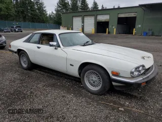1989 Jaguar XJS z VIN SAJNA5840KC150684, wystawiony jako Copart lot #48081805 z przebiegiem 93 444 mil mil oraz Czysty tytuł • Clean title. Historia ofert i sprzedaży dostępna na DreamBid. Obrazek 4.