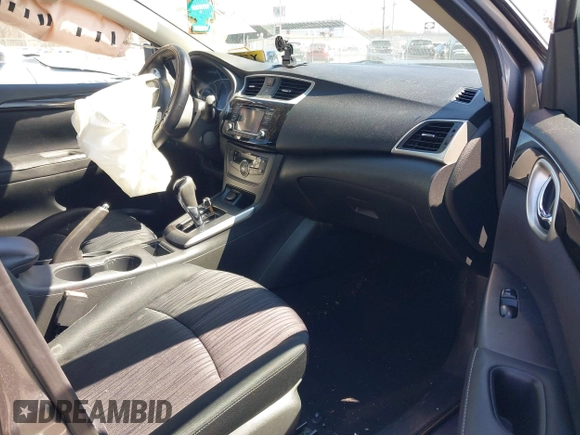 2018 Nissan Sentra SV with VIN 3N1AB7AP3JL633148, listed as a IAAI auction lot 41983588 with 148,479 mi miles and . Bid and sale history available at DreamBid. Image 5.