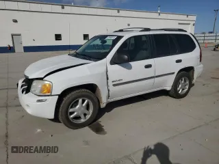 2006 GMC Envoy SLE z VIN 1GKDT13S462156541, wystawiony jako Copart lot #52500615 z przebiegiem 140 558 mil mil oraz Szkody całkowita. Historia ofert i sprzedaży dostępna na DreamBid. Obrazek 1.