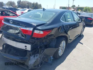 2014 Lexus ES 330 with VIN JTHBK1GG0E2117003, listed as a IAAI auction lot 42520609 with 97,207 mi miles and . Bid and sale history available at DreamBid. Image 4.
