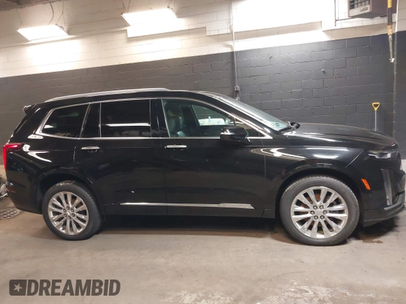 2020 Cadillac XT6 AWD Premium Luxury with VIN 1GYKPDRSXLZ111021, listed as a IAAI auction lot 37922511 with 54,755 mi miles and . Bid and sale history available at DreamBid. Image 13.