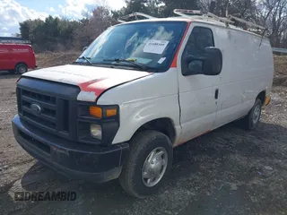 2011 Ford Econoline Cargo Commercial with VIN 1FTNE1EW5BDA36434, listed as a IAAI auction lot 41688109 with 240,000 mi miles and . Bid and sale history available at DreamBid. Image 2.