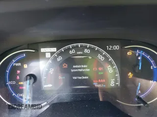 2021 Toyota RAV4 Hybrid XSE with VIN 2T3E6RFV8MW026973, listed as a IAAI auction lot 42052289 with 94,857 mi miles and . Bid and sale history available at DreamBid. Image 7.