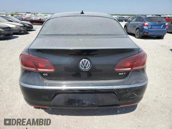2014 Volkswagen CC Sport with VIN WVWBN7AN6EE529590, listed as a Copart auction lot 88780515 with 123,392 mi miles and Salvage Title. Bid and sale history available at DreamBid. Image 6.