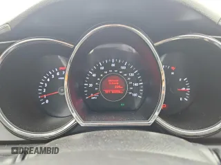 2013 Kia Optima EX z VIN 5XXGN4A79DG162815, wystawiony jako Copart lot #59282275 z przebiegiem 163 920 mil mil oraz Szkoda całkowita • Salvage title. Historia ofert i sprzedaży dostępna na DreamBid. Obrazek 9.