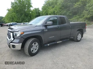 2021 Toyota Tundra SR with VIN 5TFUY5F18MX971347, listed as a Copart auction lot 61045165 with 73,371 mi miles and Salvage title. Bid and sale history available at DreamBid. Image 1.