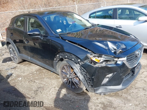 2017 Mazda CX-3 Touring with VIN JM1DKFC70H0171771, listed as a IAAI auction lot 41870395 with 100,472 mi miles. Bid and sale history available at carsss.com. Image 1.