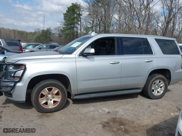 2017 Chevrolet Tahoe Commercial with VIN 1GNLCDECXHR238788, listed as a IAAI auction lot 41718161 with 129,880 mi miles. Bid and sale history available at carsss.com. Image 14.
