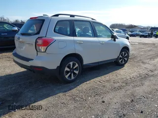 2017 Subaru Forester with VIN JF2SJABC2HH406735, listed as a IAAI auction lot 41869995 with 141,456 mi miles and . Bid and sale history available at DreamBid. Image 4.