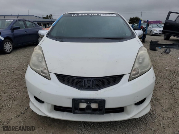 2009 Honda Fit Sport with VIN JHMGE88449S010357, listed as a Copart auction lot 50795585 with 214,008 mi miles and Clean Title. Bid and sale history available at carsss.com. Image 5.