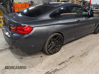 2014 BMW 4 Series 428i xDrive with VIN WBA3N5C56EF716258, listed as a Copart auction lot 52916185 with 106,512 mi miles and Salvage Title. Bid and sale history available at DreamBid. Image 4.