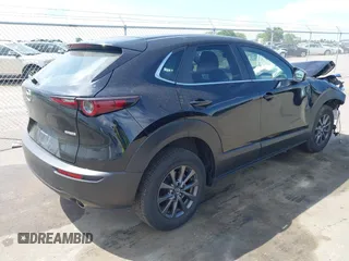 2021 Mazda CX-30 S with VIN 3MVDMBAL0MM254030, listed as a IAAI auction lot 42261180 with 72,459 mi miles and . Bid and sale history available at DreamBid. Image 4.