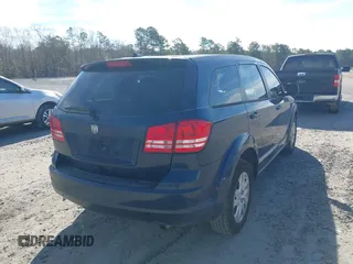 2014 Dodge Journey SE with VIN 3C4PDCABXET277723, listed as a IAAI auction lot 41709752 with 161,587 mi miles and . Bid and sale history available at DreamBid. Image 4.