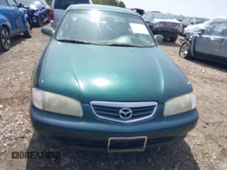 2001 Mazda 626 LX with VIN 1YVGF22D915241384, listed as a IAAI auction lot 41927705 with 231,801 mi miles. Bid and sale history available at carsss.com. Image 6.