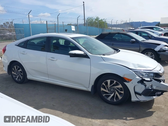 2017 Honda Civic EX z VIN 2HGFC2F76HH514686, wystawiony jako IAAI lot #41936117 z przebiegiem 56 711 mil mil oraz . Historia ofert i sprzedaży dostępna na DreamBid. Obrazek 13.