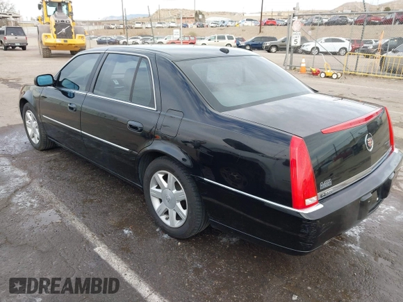 2006 Cadillac DTS w/1SC with VIN 1G6KD57Y96U251691, listed as a IAAI auction lot 41086147 with 128,959 mi miles. Bid and sale history available at carsss.com. Image 14.