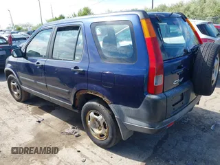 2004 Honda CR-V LX with VIN JHLRD78454C026161, listed as a IAAI auction lot 42147980 with 217,243 mi miles and . Bid and sale history available at carsss.com. Image 3.