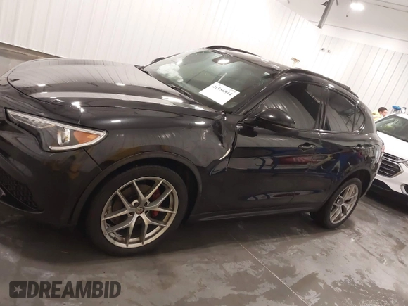 2019 Alfa Romeo Stelvio Ti with VIN ZASPAKBN3K7C71569, listed as a IAAI auction lot 41556814 with 87,279 mi miles and . Bid and sale history available at DreamBid. Image 15.