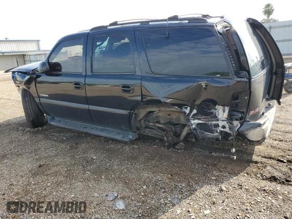 2000 GMC Yukon SLT with VIN 1GKEK13T3YJ202112, listed as a Copart auction lot 71713084 with 303,866 mi miles and Salvage Title. Bid and sale history available at carsss.com. Image 2.