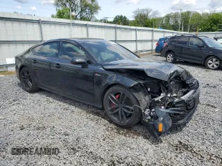 2018 Audi A7 Premium Plus with VIN WAUW3AFC8JN077743, listed as a Copart auction lot 58638925 with 49,062 mi miles and Salvage title. Bid and sale history available at DreamBid. Image 4.