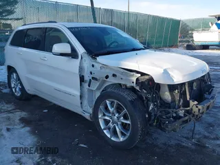 2016 Jeep Grand Cherokee Summit z VIN 1C4RJFJTXGC489631, wystawiony jako IAAI lot #41379162 z przebiegiem 97 605 mil mil oraz . Historia ofert i sprzedaży dostępna na DreamBid. Obrazek 1.