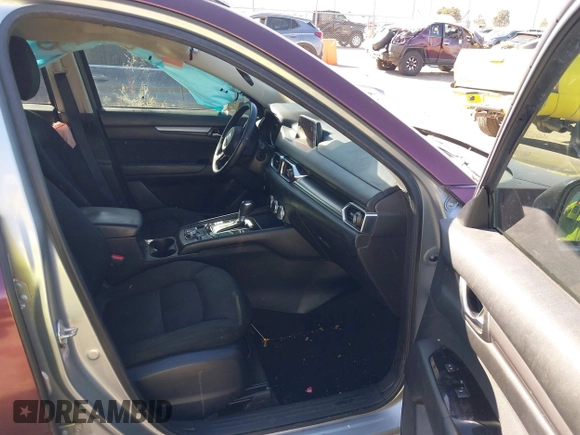 2019 Mazda CX-5 Sport with VIN JM3KFABM2K0686372, listed as a IAAI auction lot 41770183 with 57,202 mi miles and . Bid and sale history available at DreamBid. Image 5.