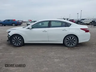 2018 Nissan Altima SR with VIN 1N4AL3AP9JC210806, listed as a IAAI auction lot 41735439 with 134,119 mi miles and . Bid and sale history available at DreamBid. Image 14.